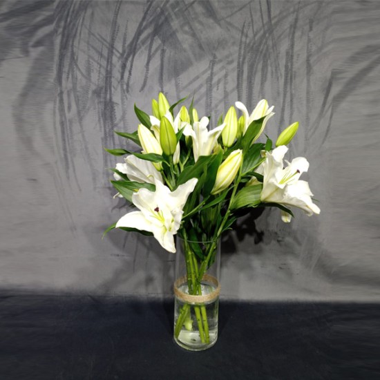 white lilium vase