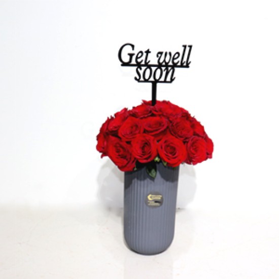 Get well soon with a red rose in a vase